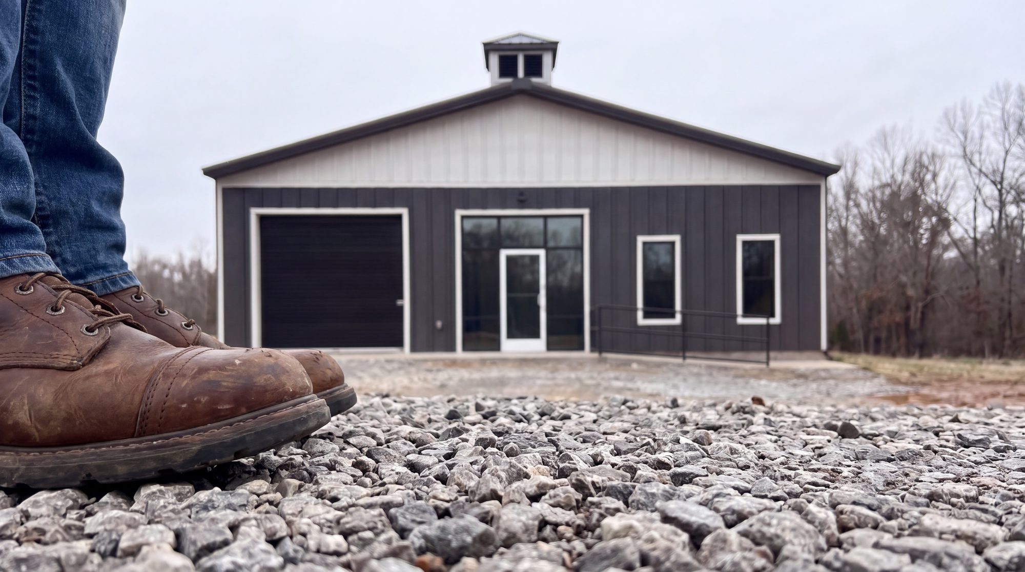 Work boots on gravel, the building behind