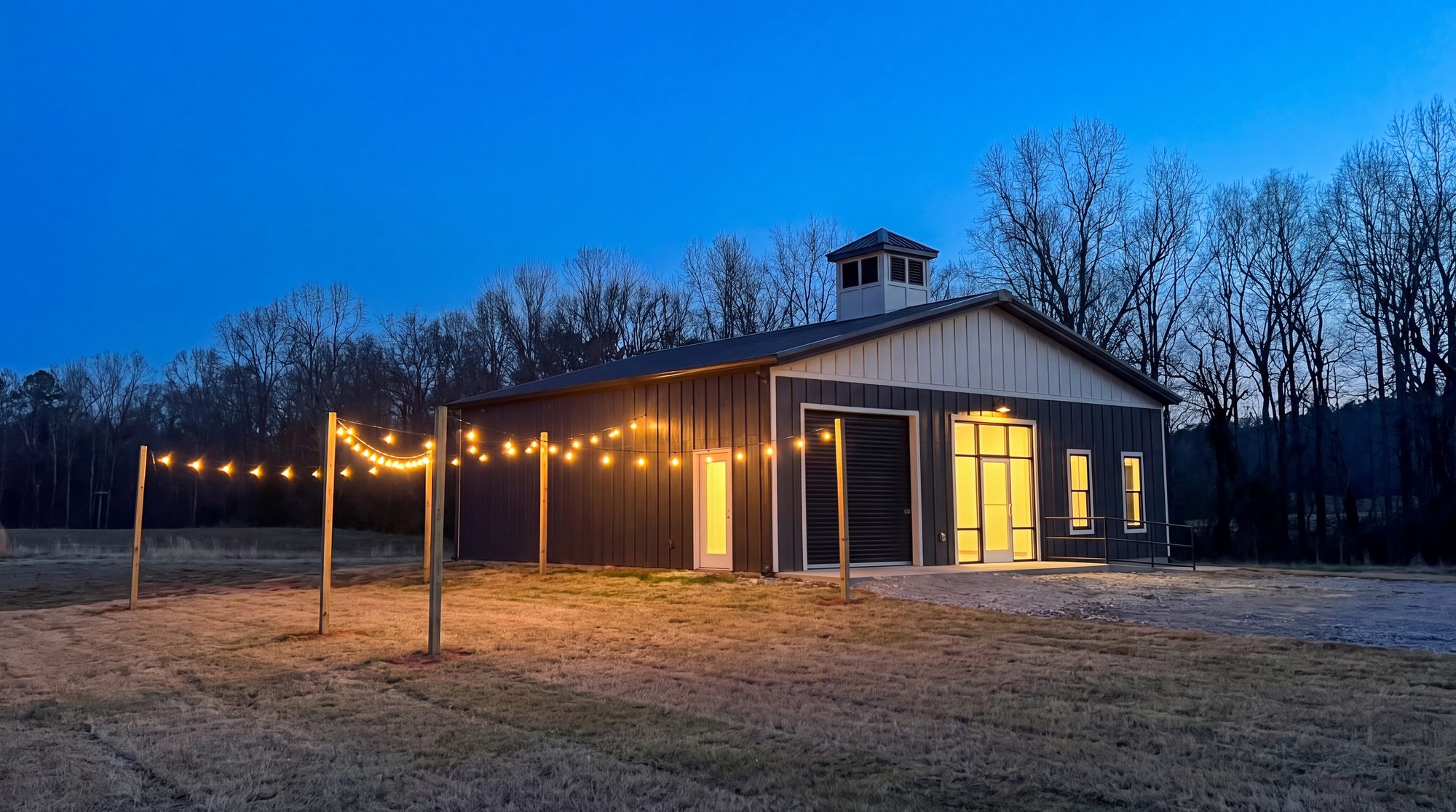 String lights over the yard at dusk